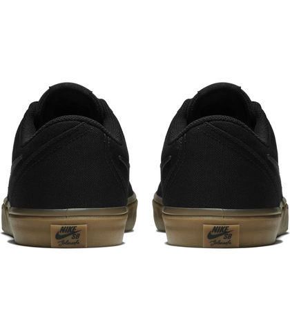 nike sb check solar black gum